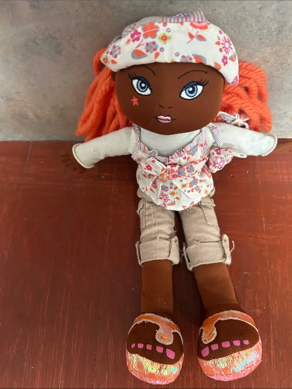 The Children's Place Brown Girl Rag Doll with Orange Yarn Hair and Floral Outfit